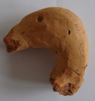 Cronica Cercetărilor Arheologice din România, Campania 2009. Raportul nr. 123, Fulgeriş, La Trei Cireşi (Dealul Fulgeriş).<br /> Sectorul Ilustratie.<br /><a href='CronicaCAfotografii/2009/preventive/123/fig8-5-Protome-zoomorfe.JPG' target=_blank>Priveşte aceeaşi imagine într-o fereastră nouă</a>